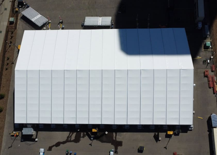 Large white event tent for weddings, festivals, and corporate events at Superior Tent Rentals.