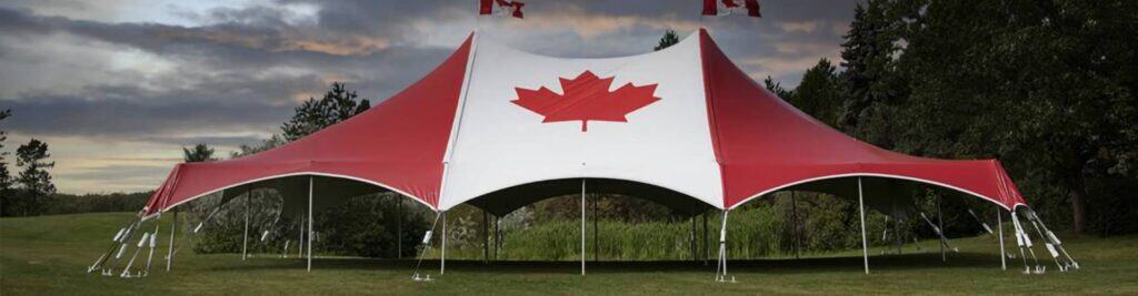 Large outdoor event tent with Canadian flag, ideal for weddings and parties, superior tent rentals.