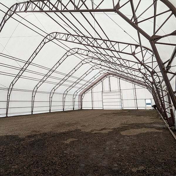 Heavy-duty event tent interior with metal frame and durable canopy, ideal for weddings, parties, and corporate events, provided by Superior Tent Rentals.