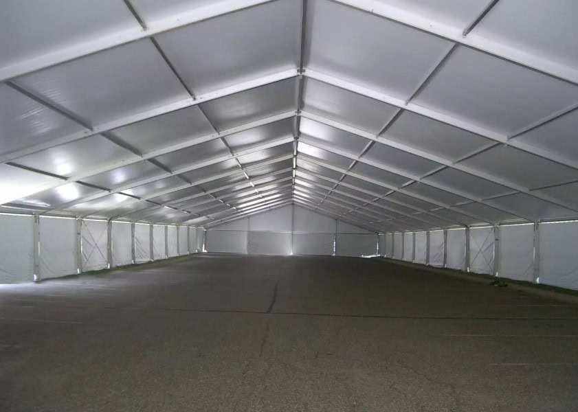 Large white event tent interior for rent, ideal for parties and gatherings.